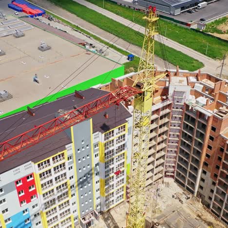 construction site shot from above. aerial view of new residential building under construction