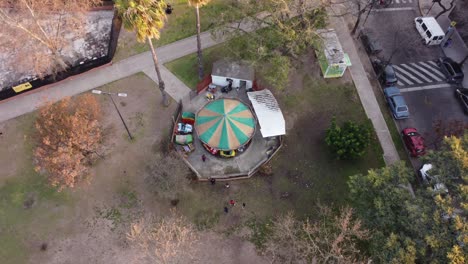 aerial - merry-go-round, carousel, in plaza mafalda, buenos aires, argentina