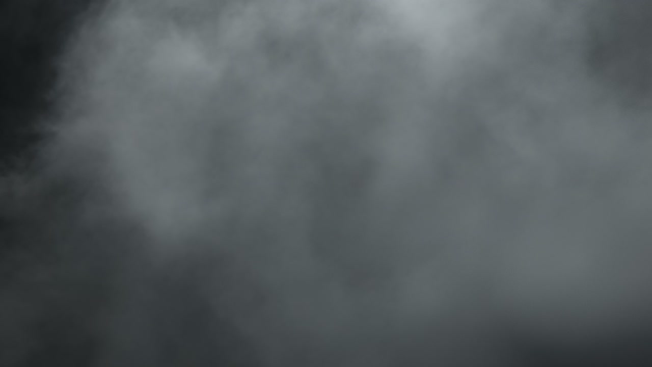 Professional 4K slow-motion VFX background of Halloween smoke and dense fog, an artistic spooky element for horror intros, eerie overlays, and cinematic visual storytelling projects