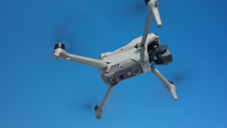 capture the precision of a professional drone in a static hover— aerial technology