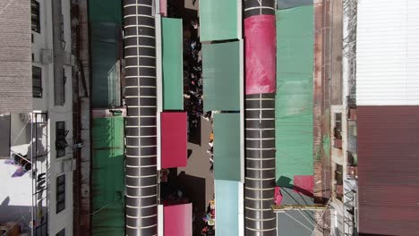 aerial view of ngau chi wan wet market rooftops, downtown hong kong with fresh meat and fish stalls.