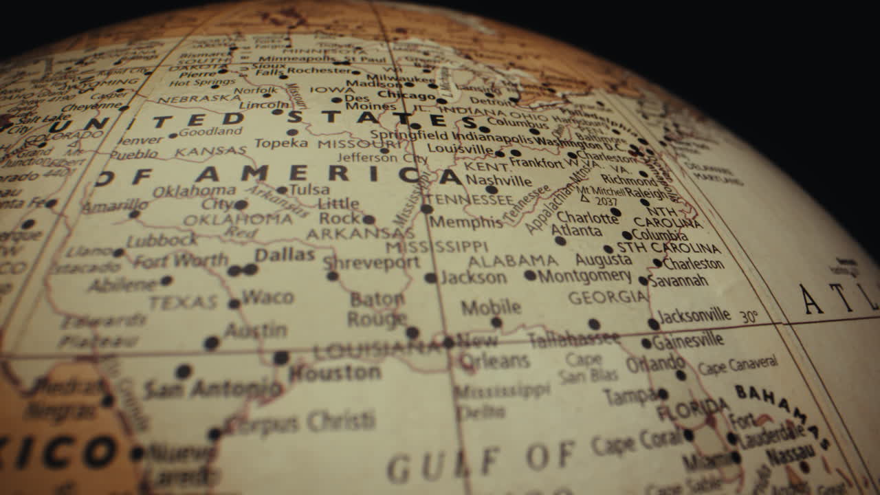 Close-up of a vintage world map, focusing on the United States
