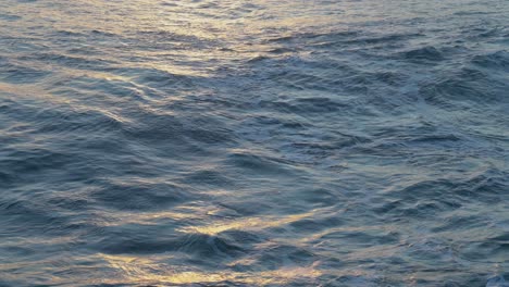 beautiful sunset light on ocean waves - close up