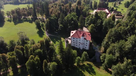 A-drone-shot-over-a-Castle-Snežnik-in-Slovenia