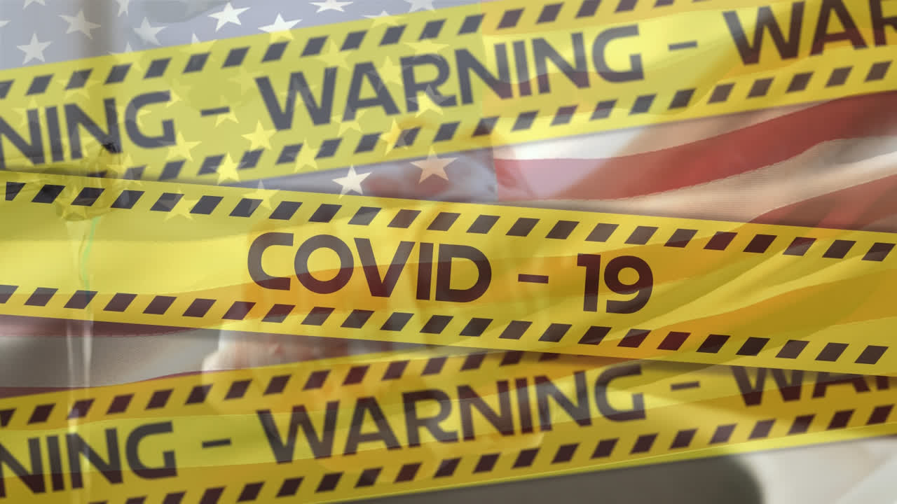 Nastri gialli della polizia sopra il lavaggio delle mani sullo sfondo di una bandiera americana che sventola.