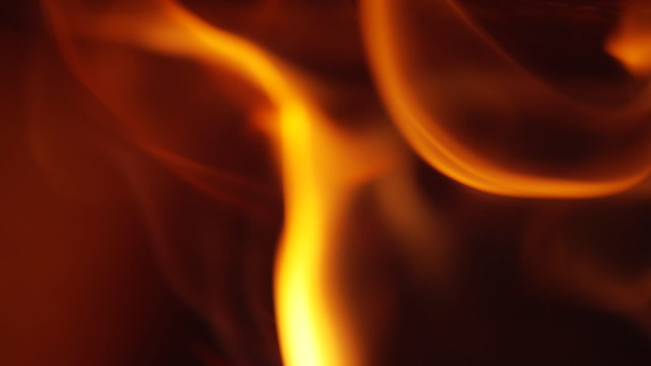 flames dancing inside a log burner