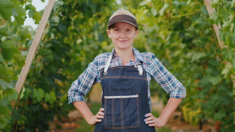 Portrait-Of-A-Farmer-Woman-Near-A-Manicured-Vineyard-Small-Business-Owner