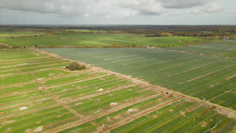 aerial view of the ongoing construction of solar farm in zwartowo, northern poland