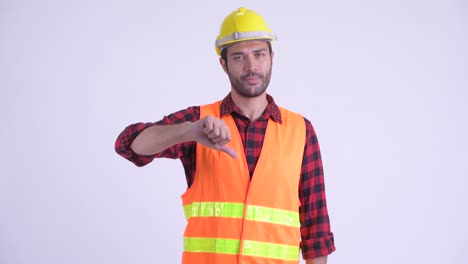 hombre persa barbudo y guapo trabajador de la construcción
