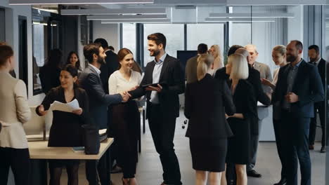 business professionals networking in a modern office environment