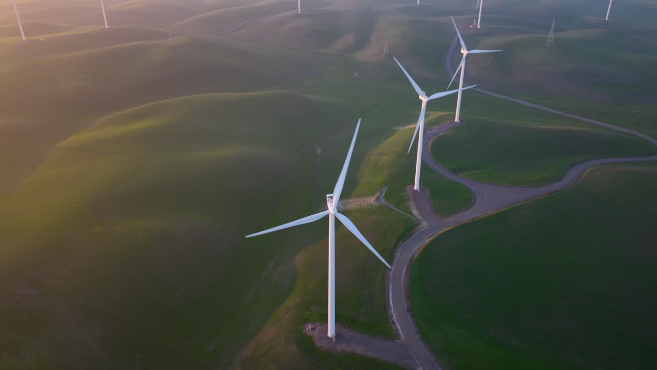 Aerial View of Wind Turbines producing clean energy at sunset, Montezuma Hills California