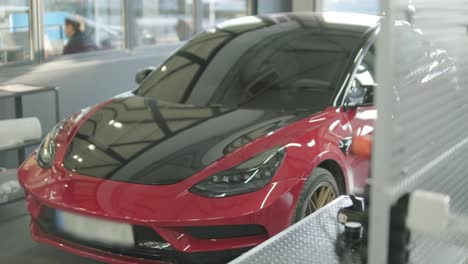 cars undergoing maintenance in auto repair shop