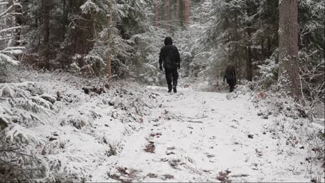 The-children-walked-alone-along-the-forest-path-in-winter