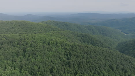 Wide-aerial-footage-showing-the-hazy-green-mountains-and-valleys-of-southern-Virginia