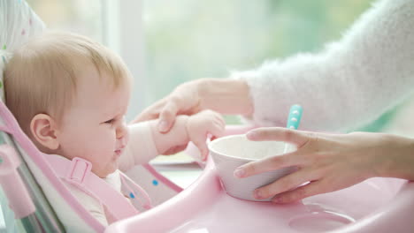 Sad-baby-dont-want-eating-porridge