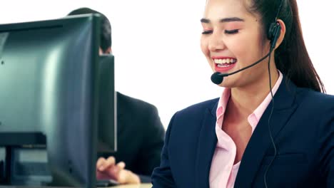 Business-people-wearing-headset-working-in-office