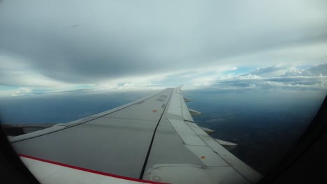 view from the aircraft window to the runway