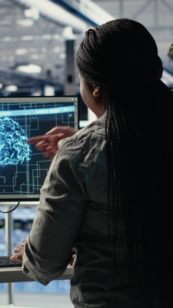 Vertical Video Army Experts In Server Room Use Artificial Intelligence Program