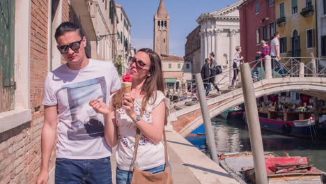 couple enjoying ice cream in venice