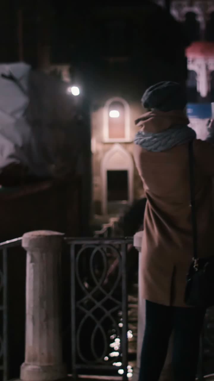 Woman in the City at Night