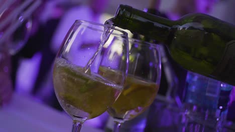 pouring wine cocktails at a party