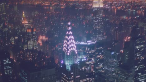 nightime aerial of manhattan new york skyline night includes chrystler building