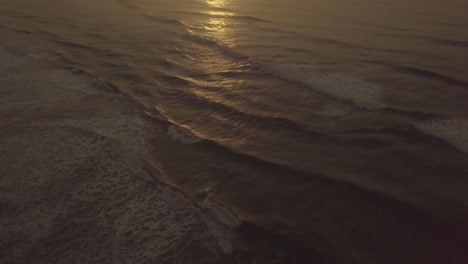 high aerial shot of atlantic ocean beach in sunset time, stunning colors