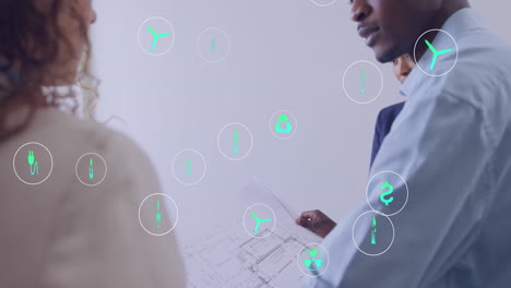 animación de iconos de la ecología sobre diversas personas de negocios en la oficina