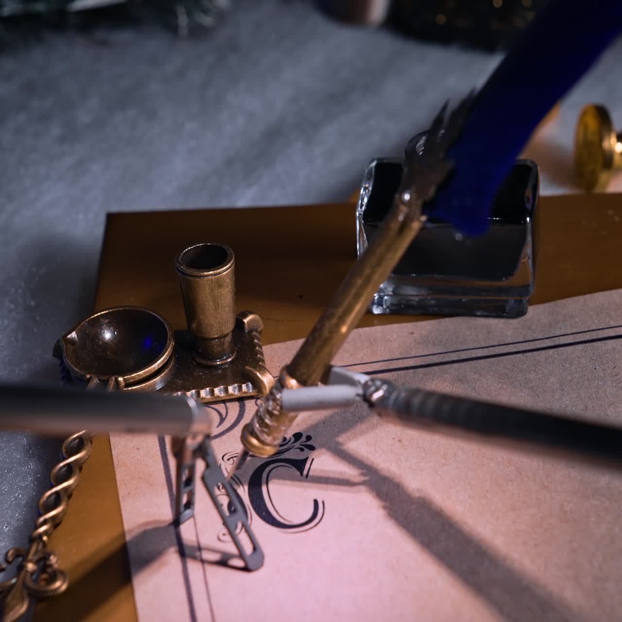 Forceps of futuristic robotic arms hold the paper and writing pen. Da Vinci surgical robot for microsurgeries writing a letter. Close up