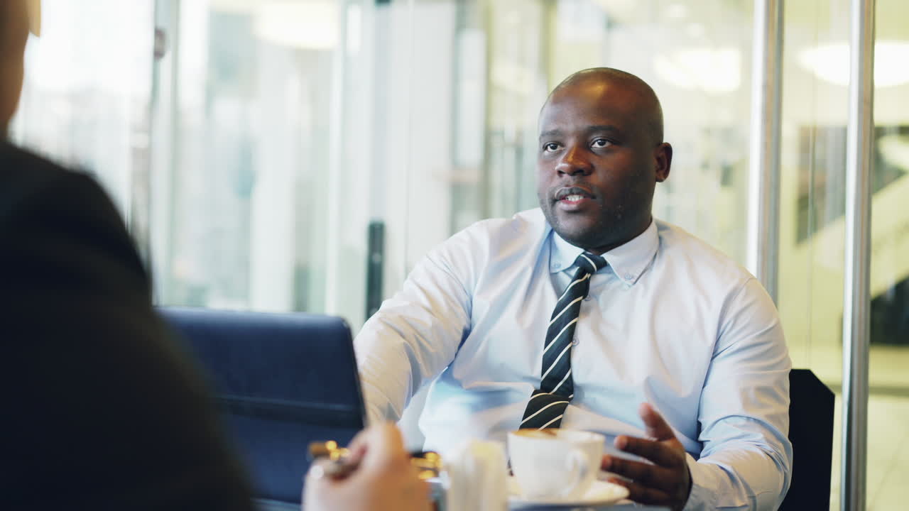 Business Meeting in a Coffee Shop