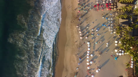 Colorful-Beach-Umbrellas-and-Blue-Ocean-San-Pancho-Mexico