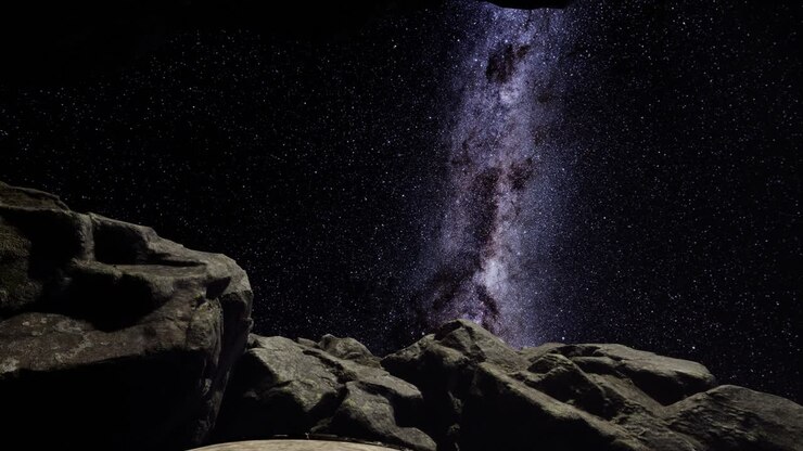 4K hyperlapse astrophotography star trails over sandstone canyon walls.