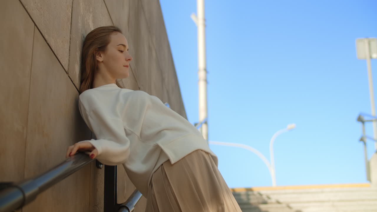 Woman in Fashionable Outfit Posing Outdoors