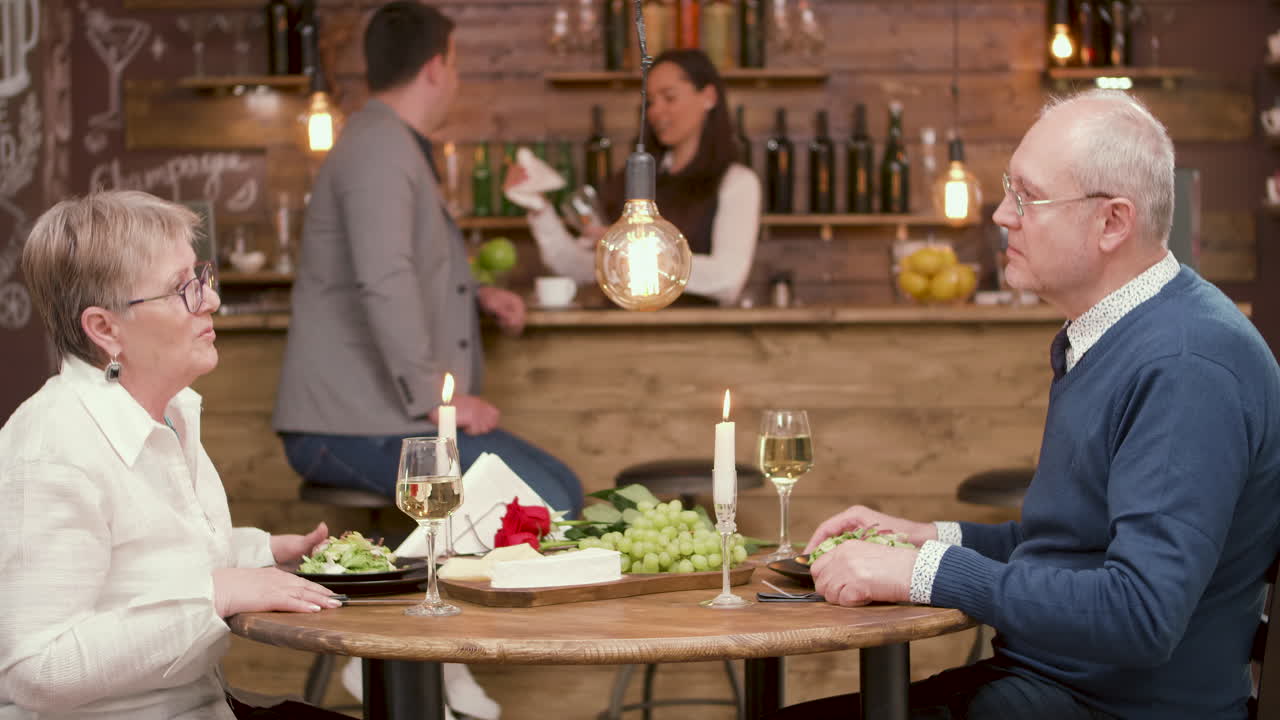 Romantic Dinner for an Elderly Couple at a Restaurant
