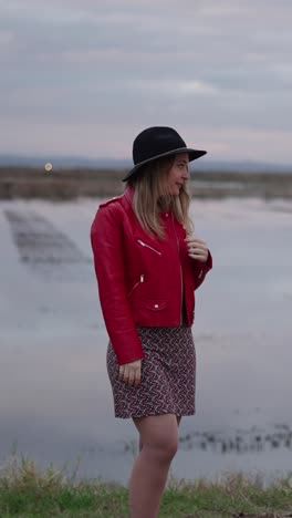 Woman in red jacket and hat