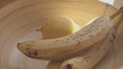 bananas circling in a wooden container. healthy and vegan food.