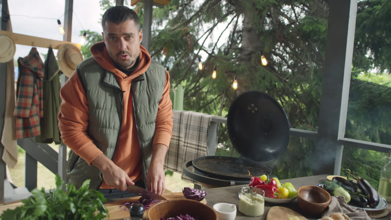 Blogger Cooking and Talking on Camera on BBQ Terrace