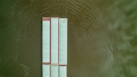 aerial view of barges on a river