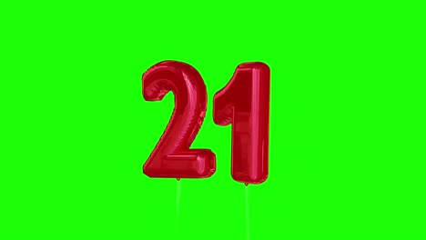 Red-twentyone-balloon-floating-to-the-top-against-greenscreen