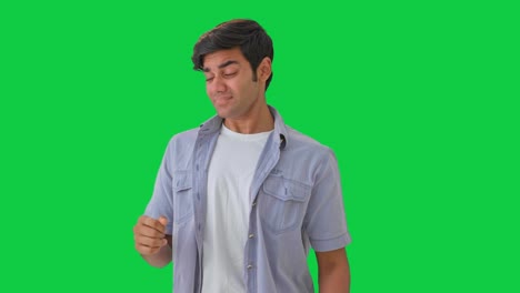 lazy young indian boy yawning green screen