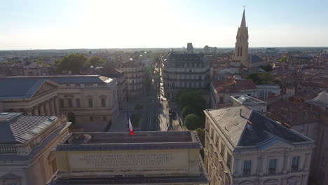 montpellier arc de triomphe aerial-view back travelling shot. sunny day france.