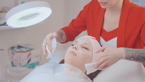 woman receiving facial treatment