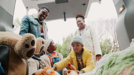 car, black family and packing for road trip
