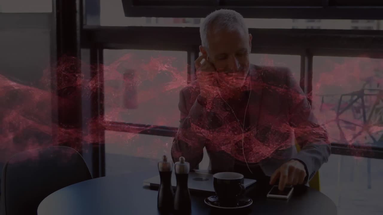 animación de ondas rojas sobre el hombre de negocios en la oficina