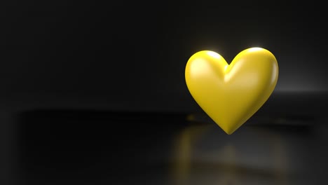 pulsing yellow heart shape object on black text space.