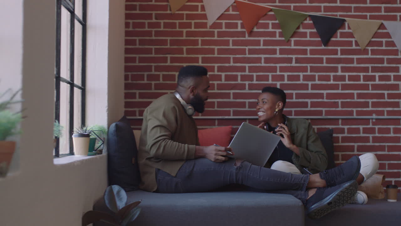 young african american business students study together working on creative project team leader woman sharing ideas with friend in modern office workplace