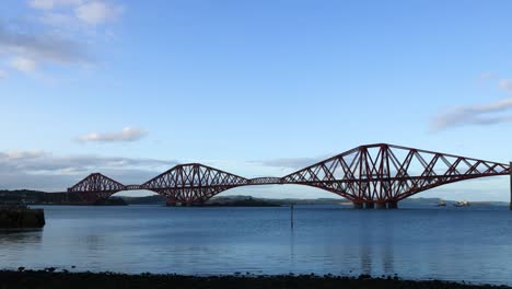 iconic bridge over calm waters at sunset