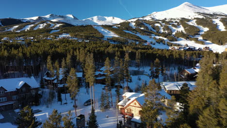 aerial mountain recreation area winter snow follow car