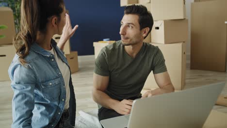 Video-of-couple-doing-shopping-online-for-a-new-house.