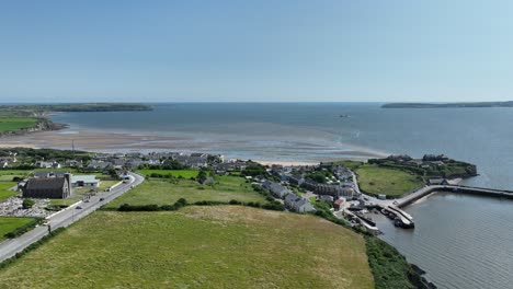 Drone-flight-over-Duncannon-Tourist-Village-and-beach-on-The-Hook-Peninsula-Co